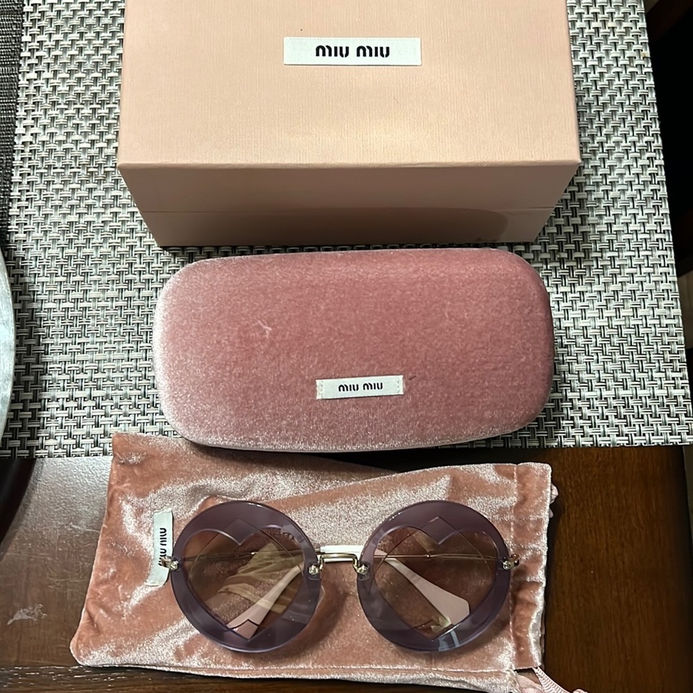Miu miu sunglasses. New without tags.